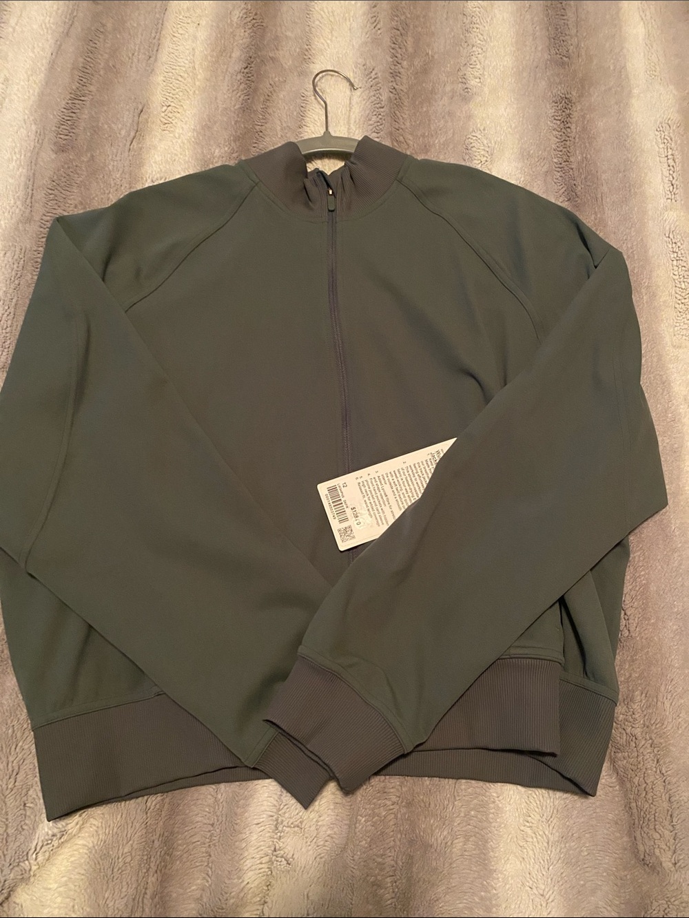 lululemon athletica Wonder Train Track Jacket in Army Green.